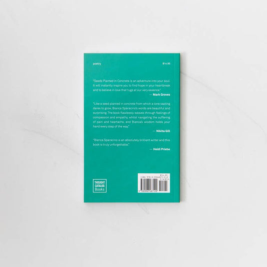 Back cover of a book with text and a barcode on a light gray background