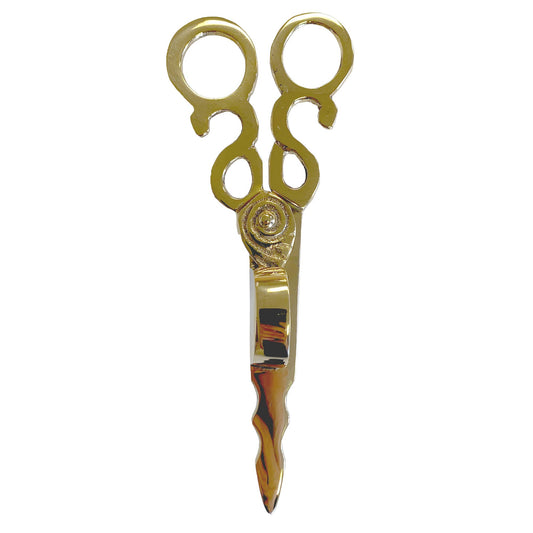 Gold decorative scissors on a white background