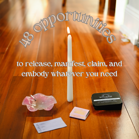 Candle and incense on a wooden floor with inspirational text overlay