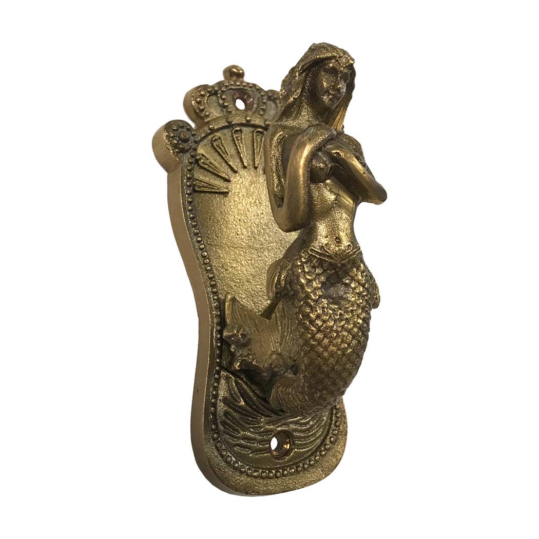 Bronze mermaid door knocker on a white background