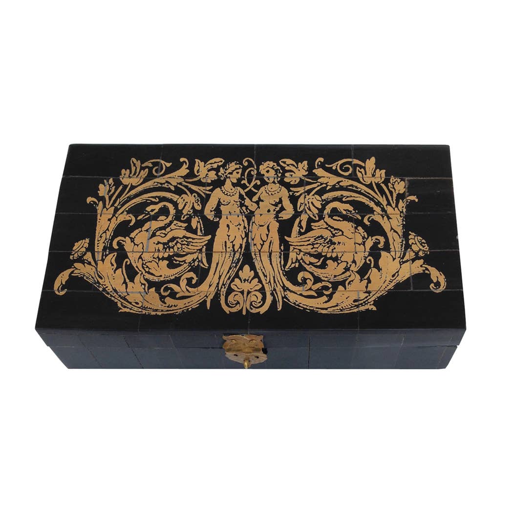 Decorative black box with gold intricate design on a white background