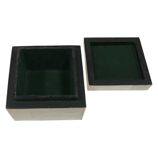 Open square box and lid lined with dark green felt inside on a white background