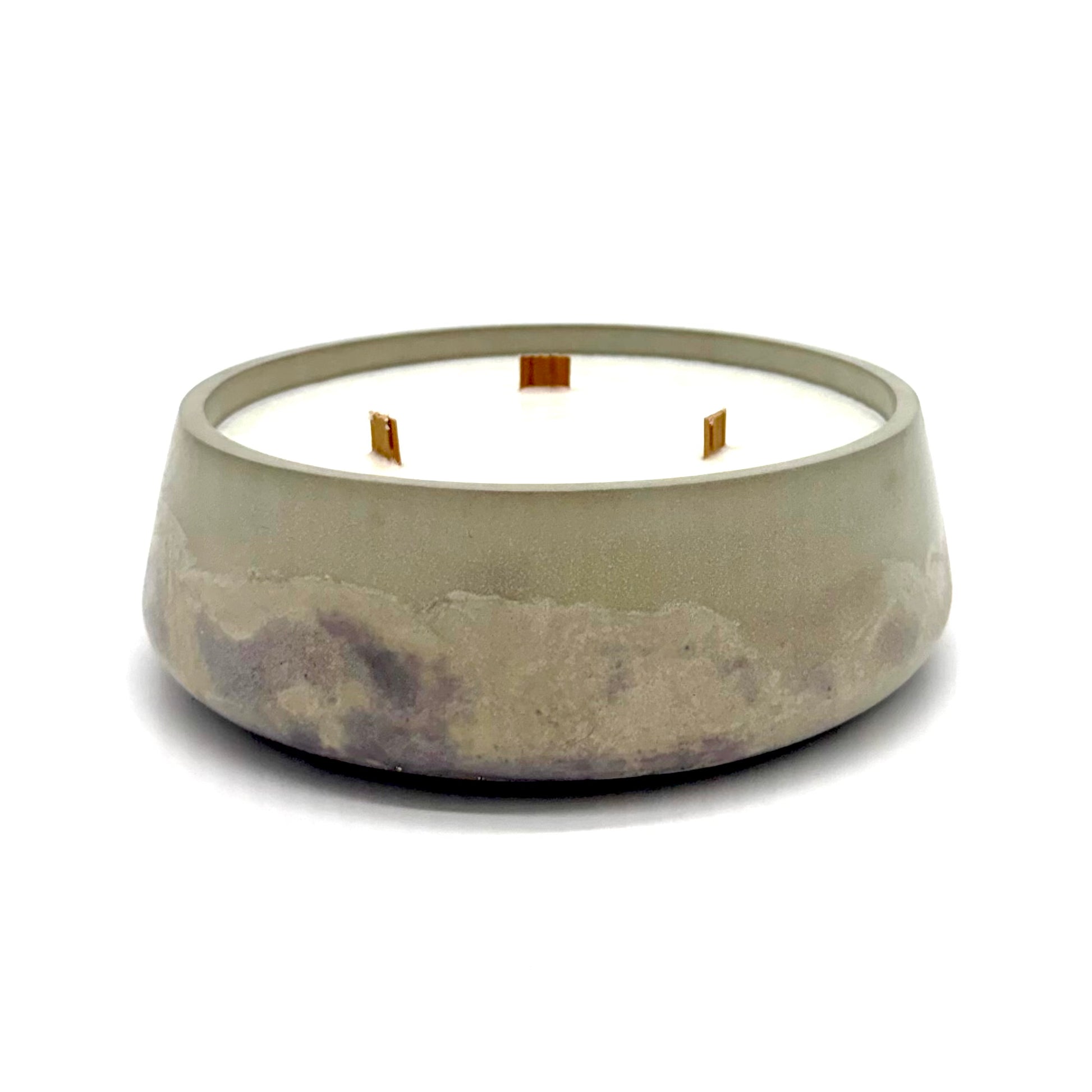 Cement-style candle holder with three wood wicks on a white background