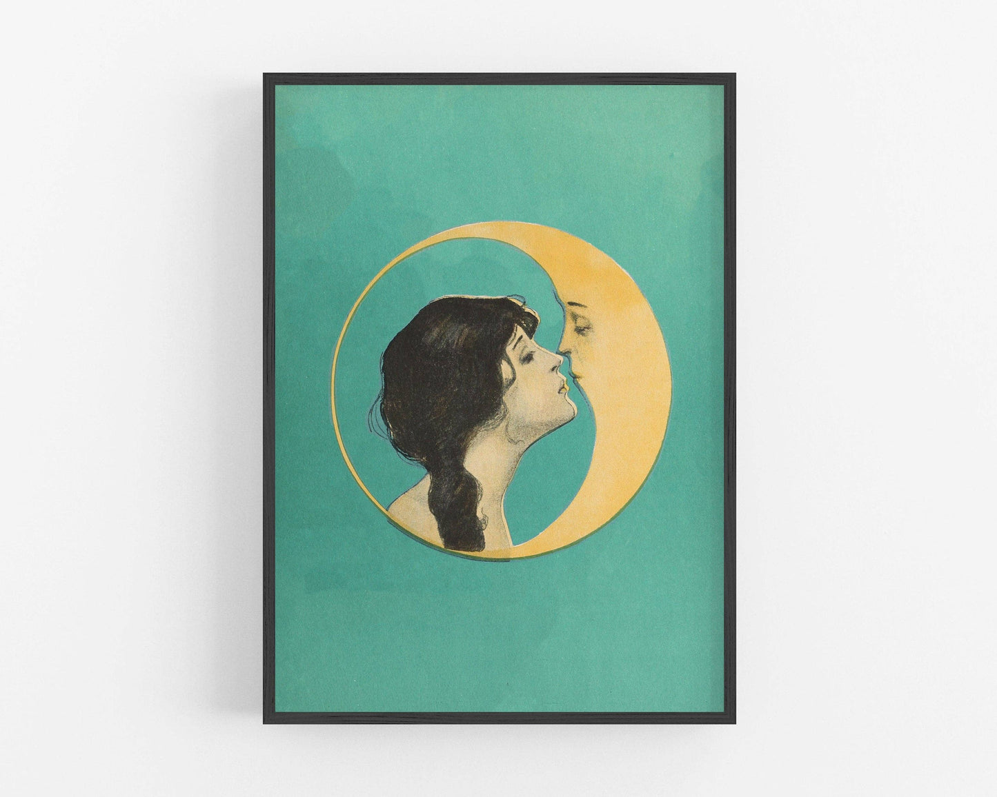 Framed artwork of a woman kissing a crescent moon on a teal background.